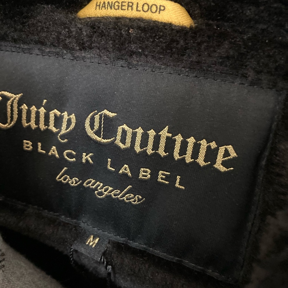 Medium faux fur black juicy couture jacket. Zip in front.  Worn twice